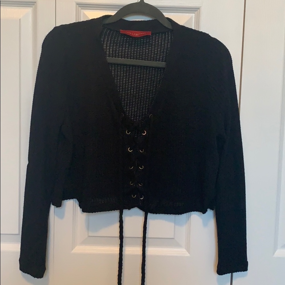 Black long sleeve top from AKIRA